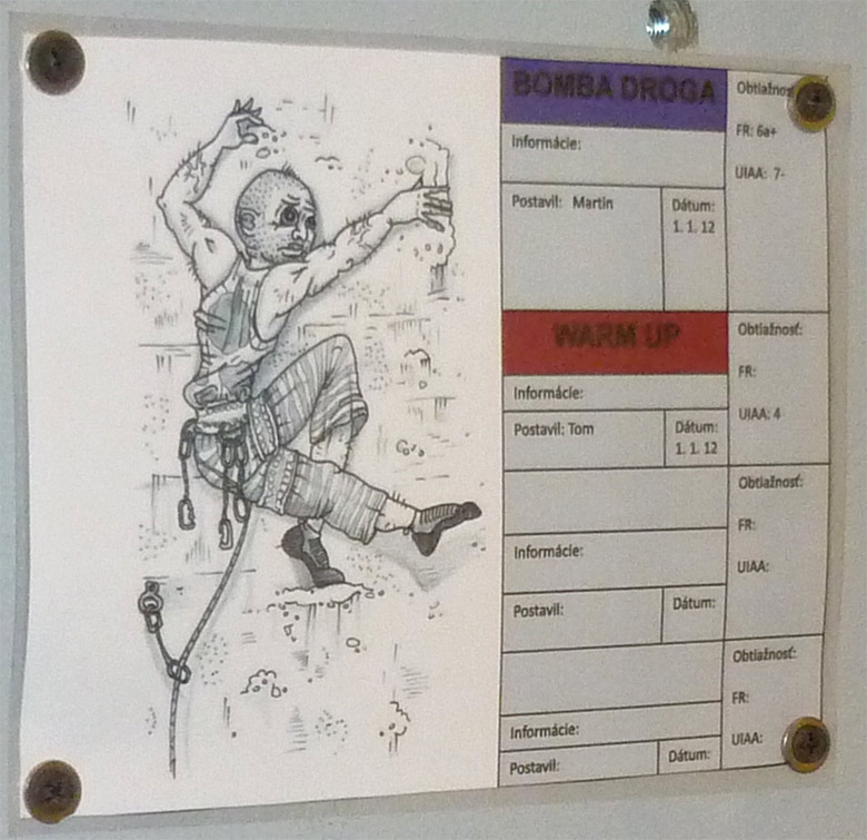 Lezecká hala K2 v Bratislave - označenie ciest s karikatúrou