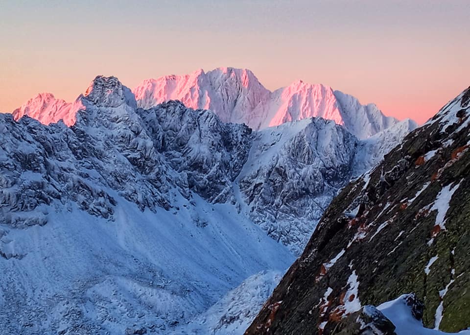 In the background in the pink Gerlach Peak massif. In the foreground Bradavica, Weszter`s Peak, Kupola and Vychodna Vysoka Peaks. Photographed from the Prostredny Hrot massif